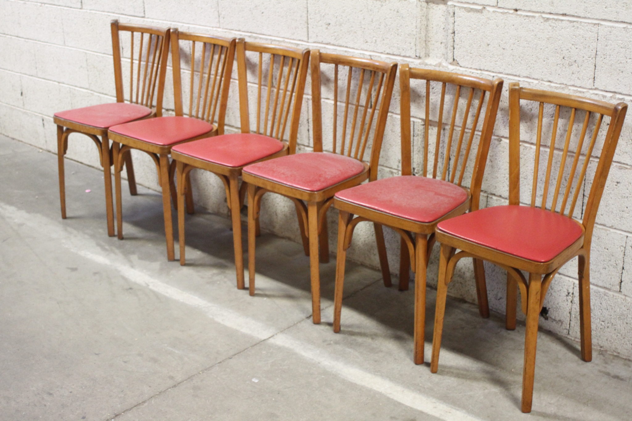 Chaises bistrot Baumann en bois et skaï