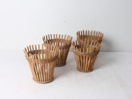 Ensemble de quatre cache-pot en rotin