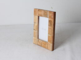 Cadre photo en bois sculpté